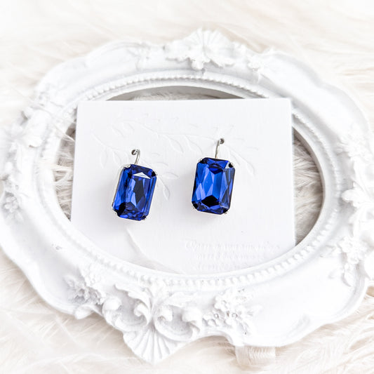 Sapphire blue crystal silver emerald cut drop earrings