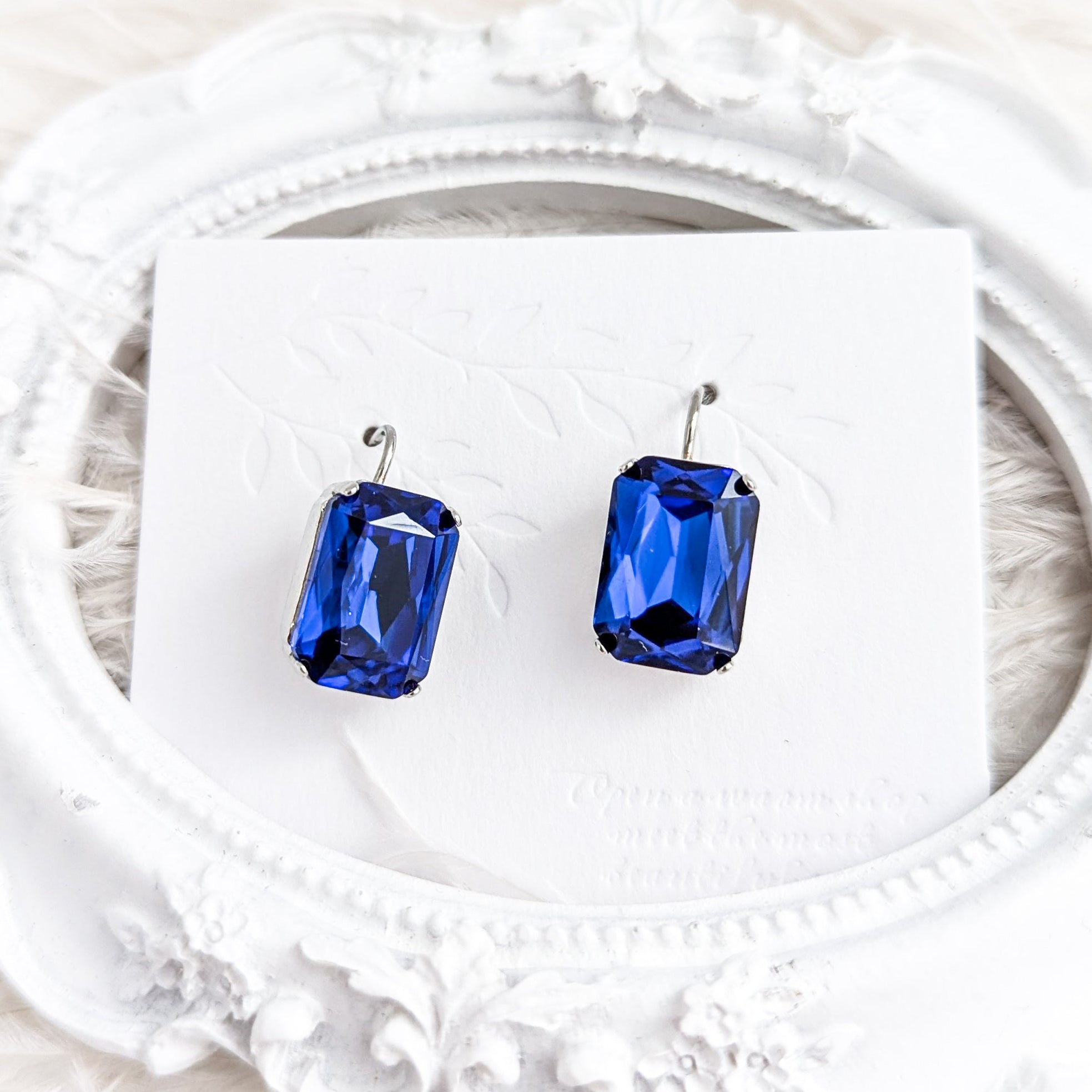 Sapphire blue crystal silver emerald cut drop earrings