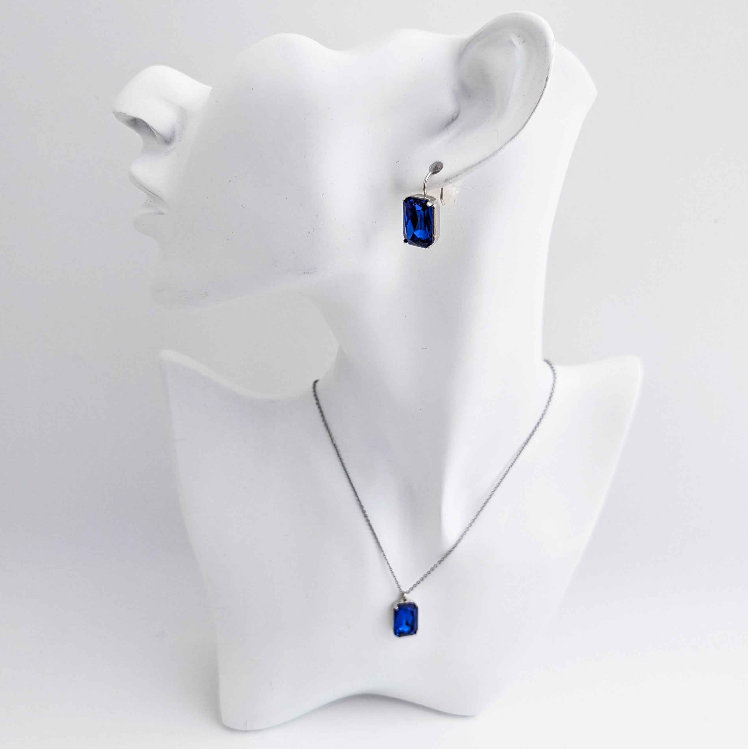 Sapphire blue crystal silver emerald cut drop earrings