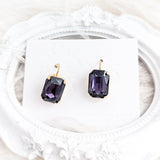 Deep amethyst purple crystal gold emerald cut drop earrings