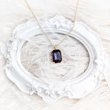 Deep amethyst purple crystal gold emerald cut necklace