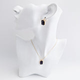 Deep amethyst purple crystal gold emerald cut necklace