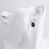 Emerald green crystal gold emerald cut drop earrings