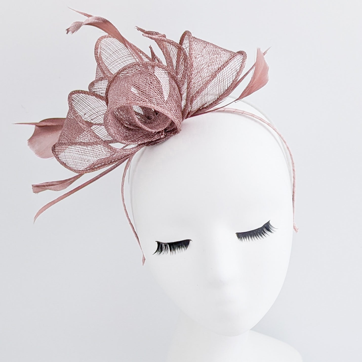 Rose gold shimmer feather fascinator hat