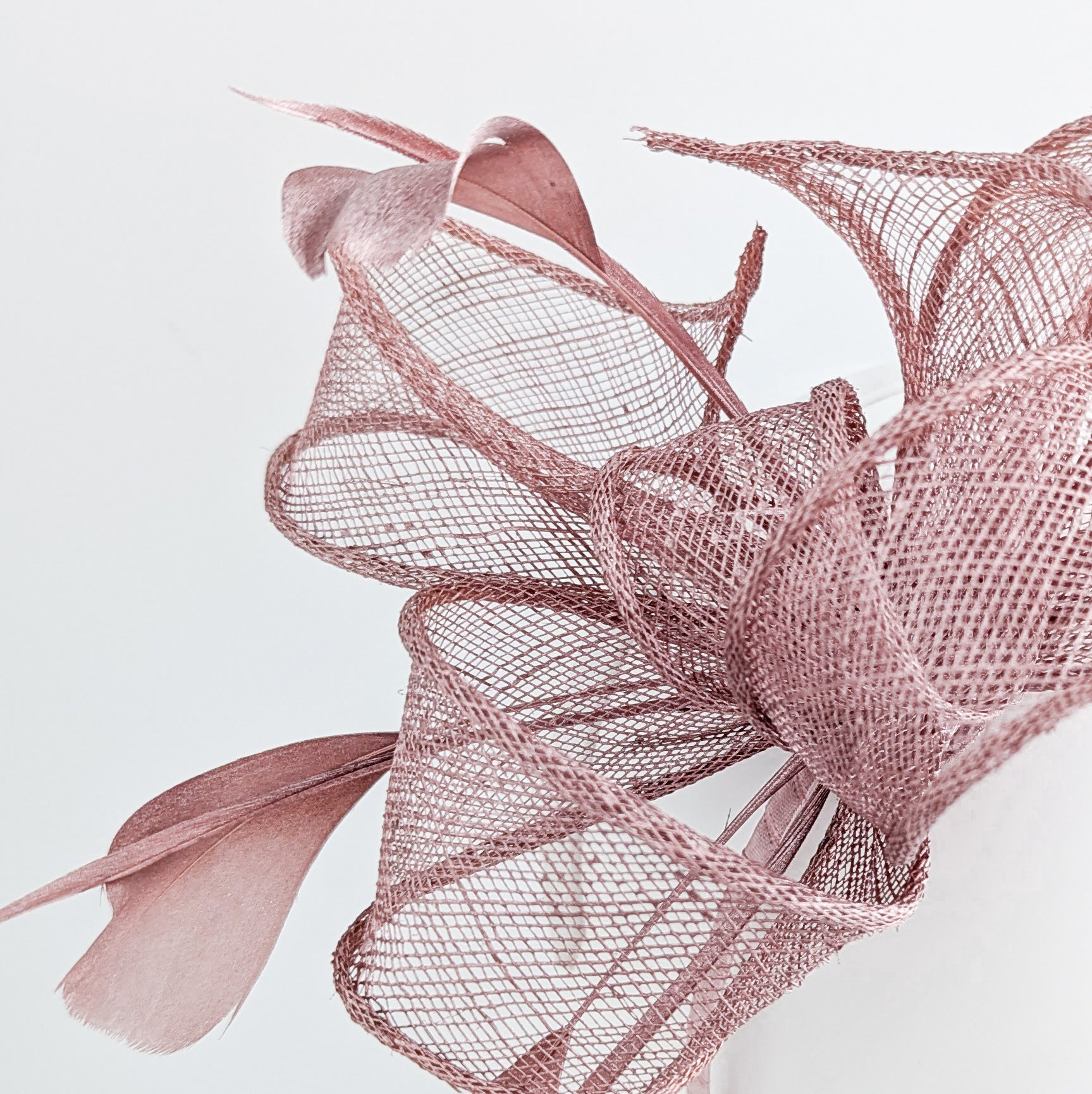 Rose gold shimmer feather fascinator hat