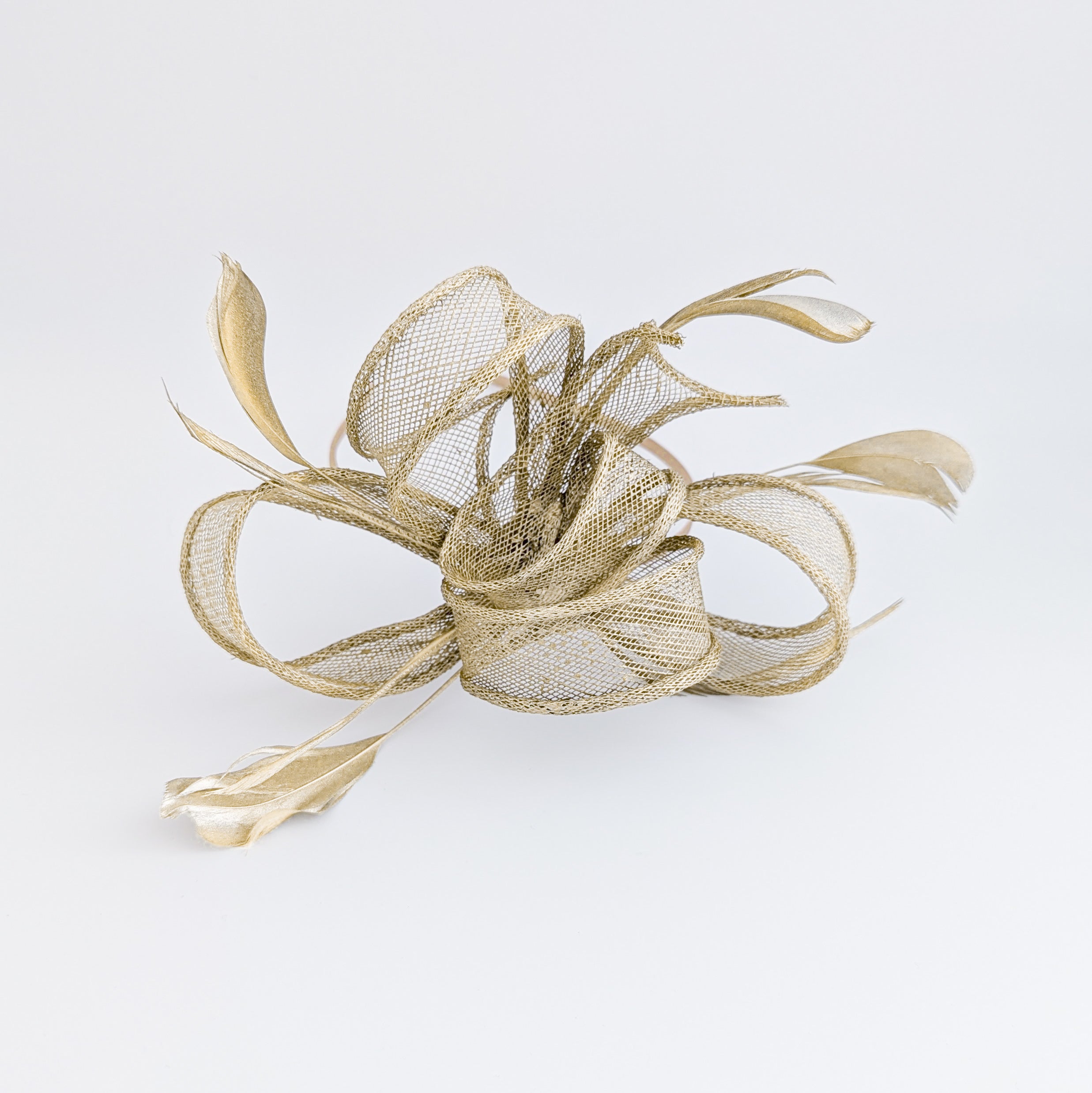 Gold shimmer feather fascinator hat House of Hats