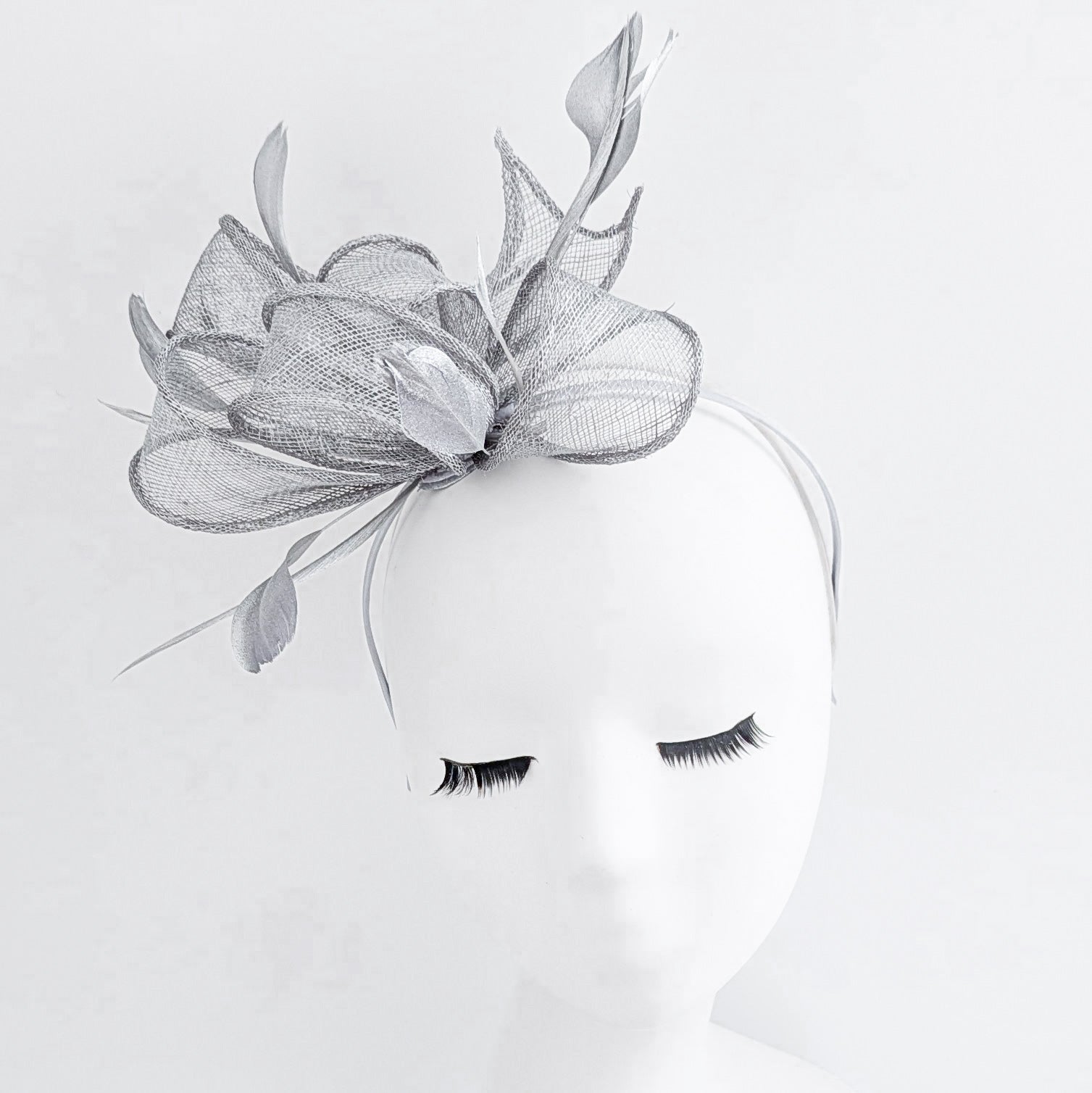 Silver shimmer feather fascinator hat