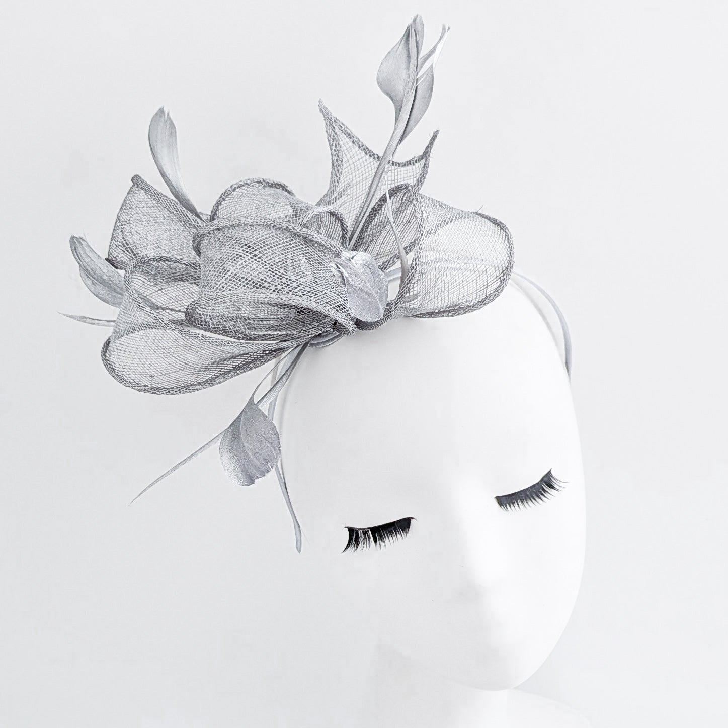 Silver shimmer feather fascinator hat