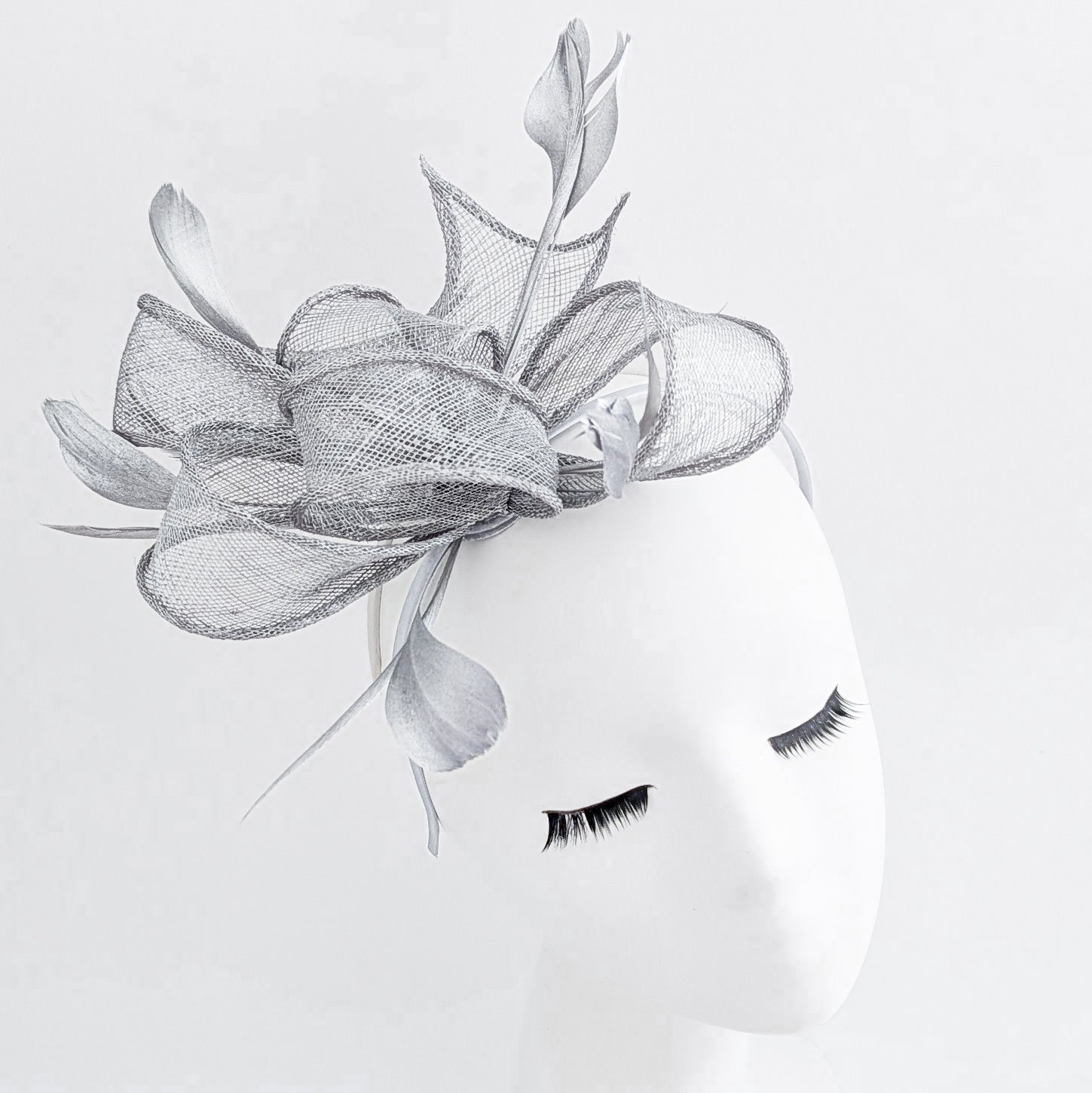 Silver shimmer feather fascinator hat