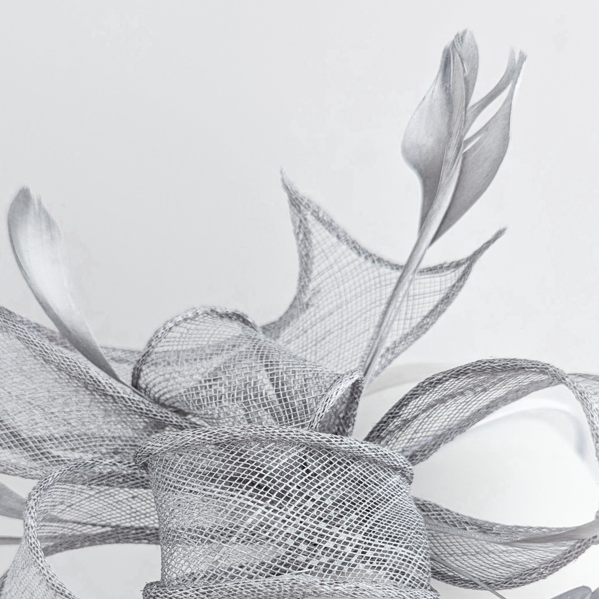 Silver shimmer feather fascinator hat