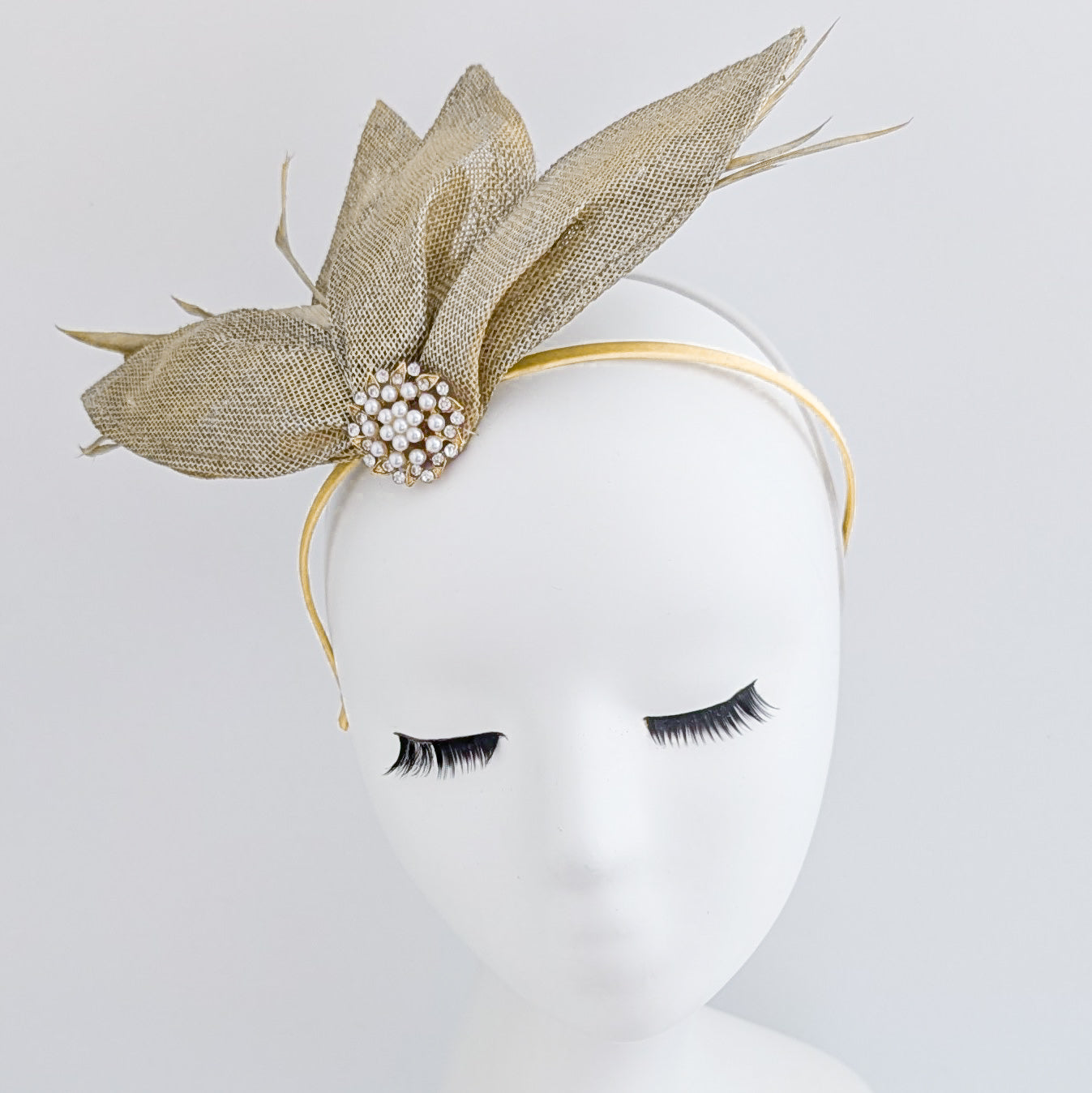 Gold shimmer feather petal fan fascinator hat