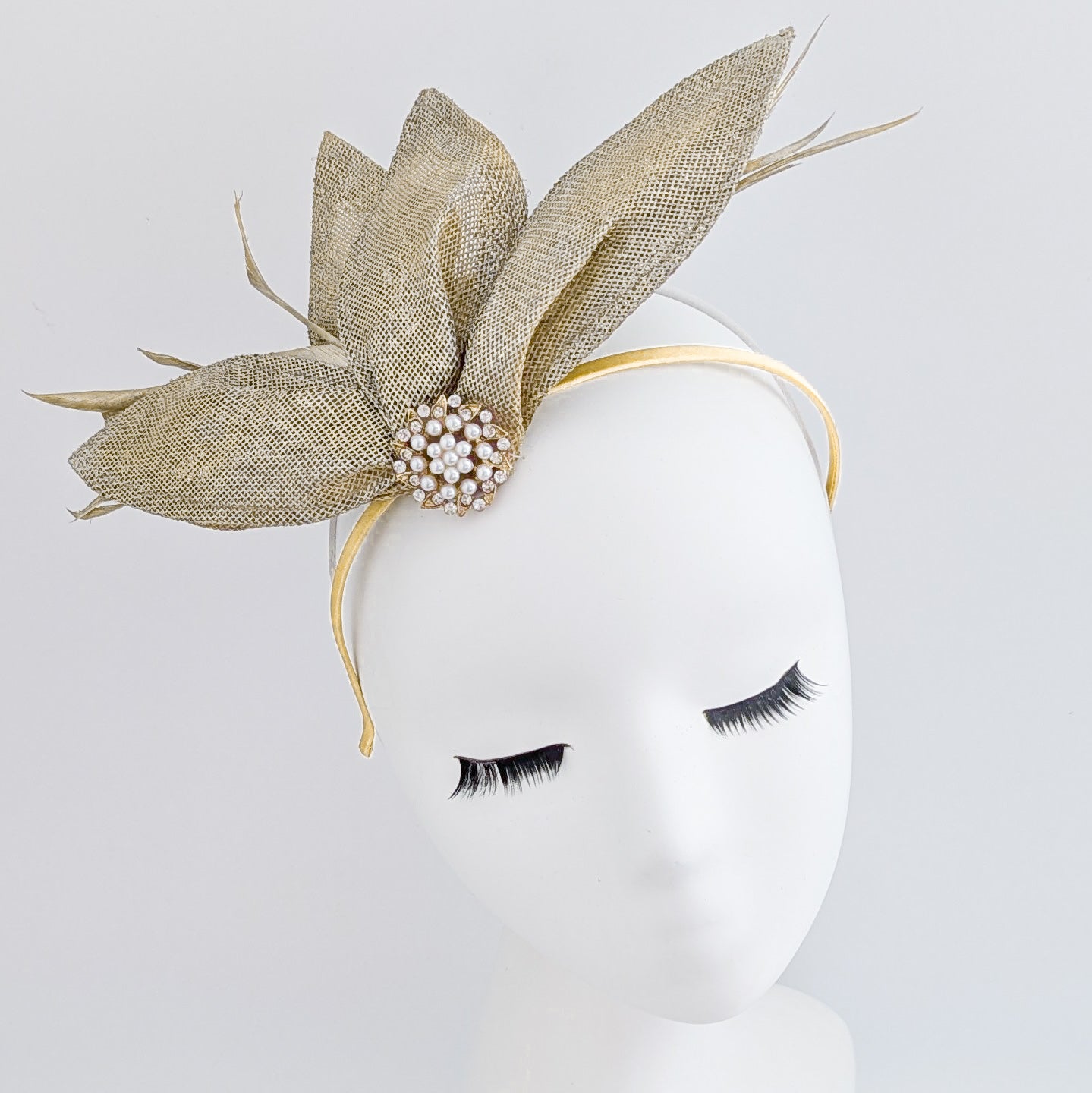 Gold shimmer feather petal fan fascinator hat