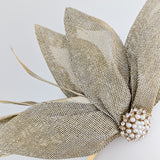 Gold shimmer feather petal fan fascinator hat