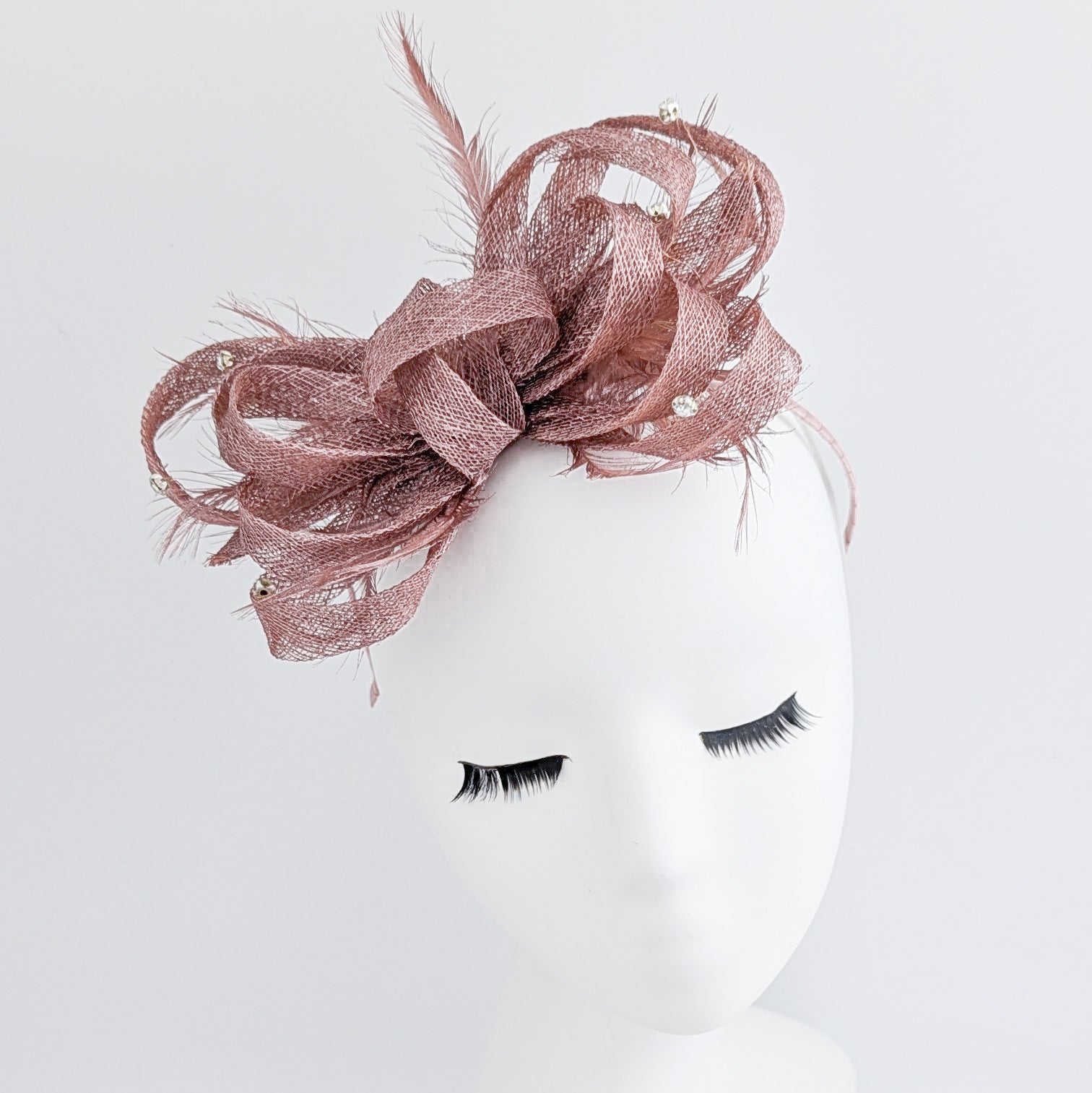 Rose gold shimmer crystal feather fascinator hat