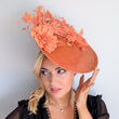 Terracotta dusty coral large flower feather disc fascinator hat