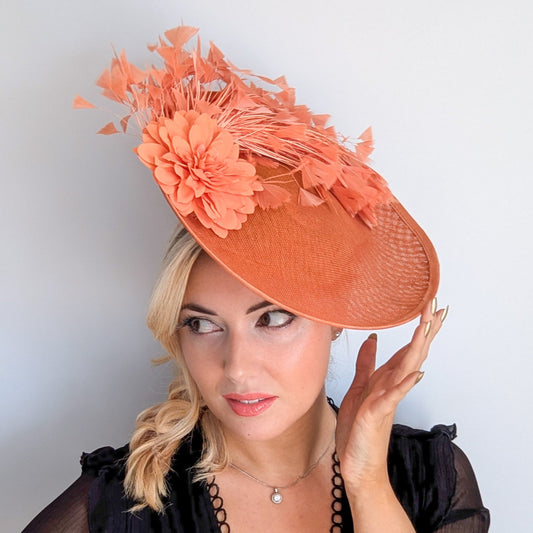 Terracotta dusty coral large flower feather disc fascinator hat