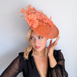 Terracotta dusty coral large flower feather disc fascinator hat