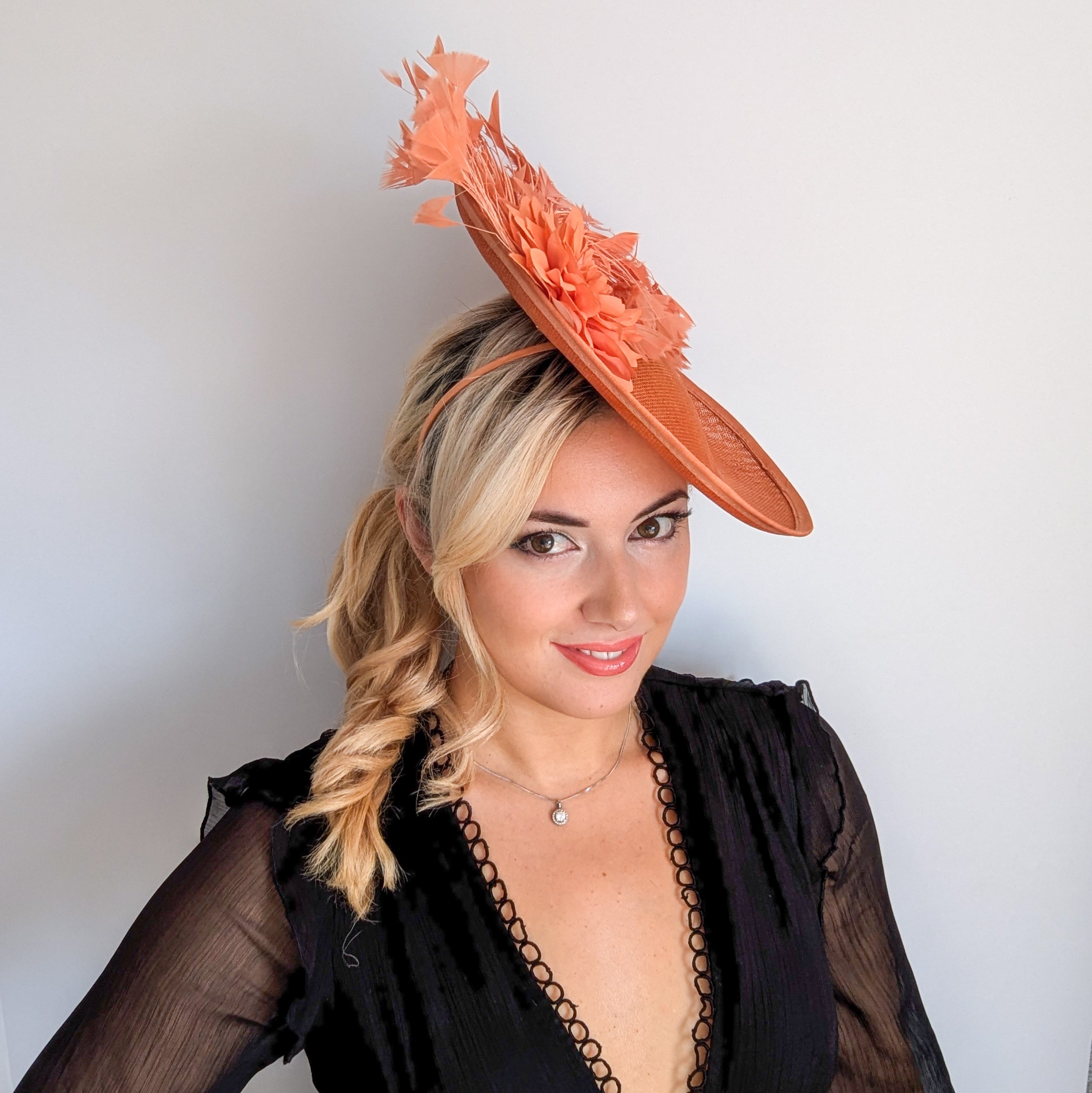 Terracotta dusty coral large flower feather disc fascinator hat