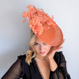 Terracotta dusty coral large flower feather disc fascinator hat