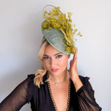 Chartreuse green feather disc fascinator hat