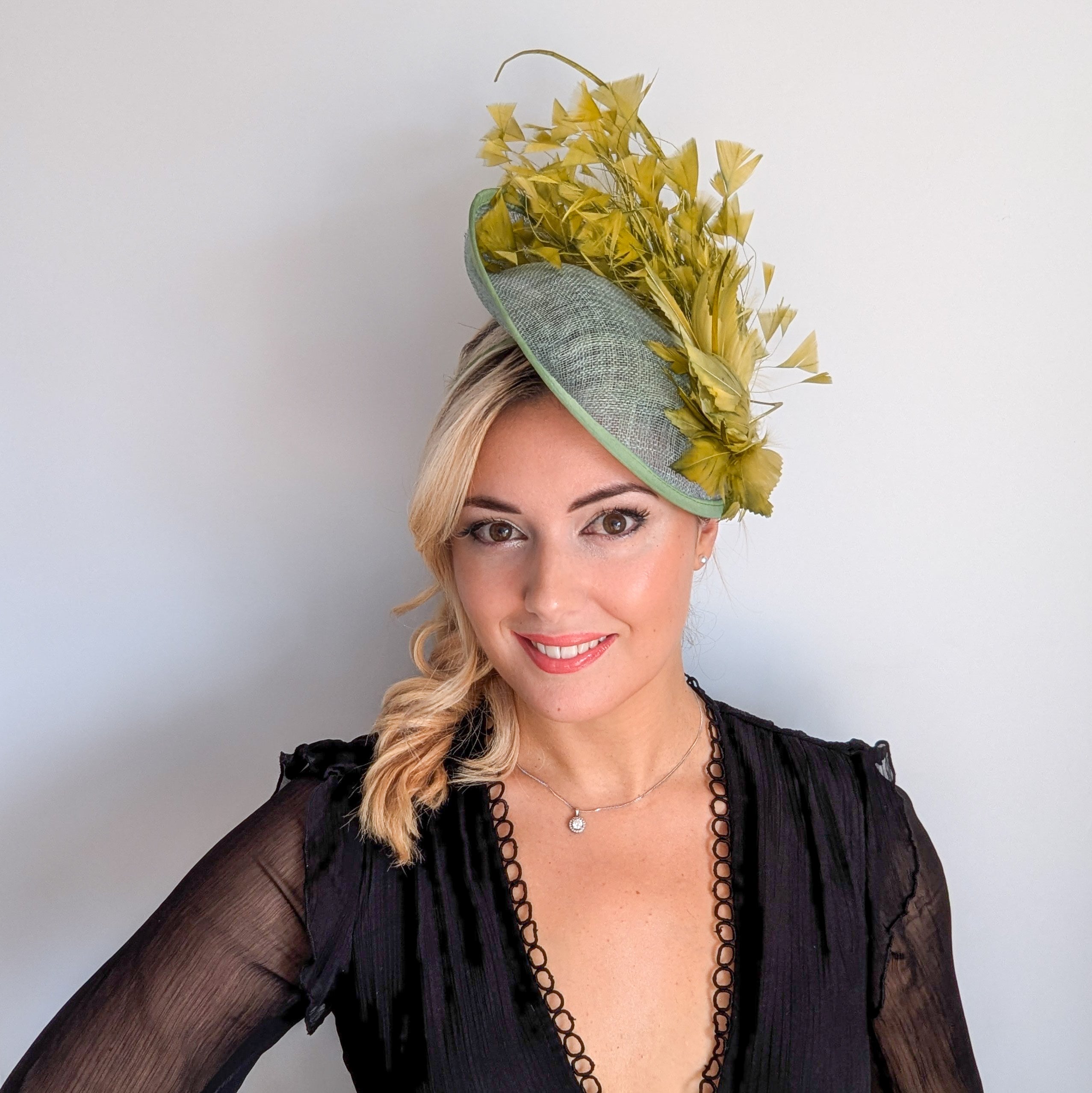 Chartreuse green feather disc fascinator hat