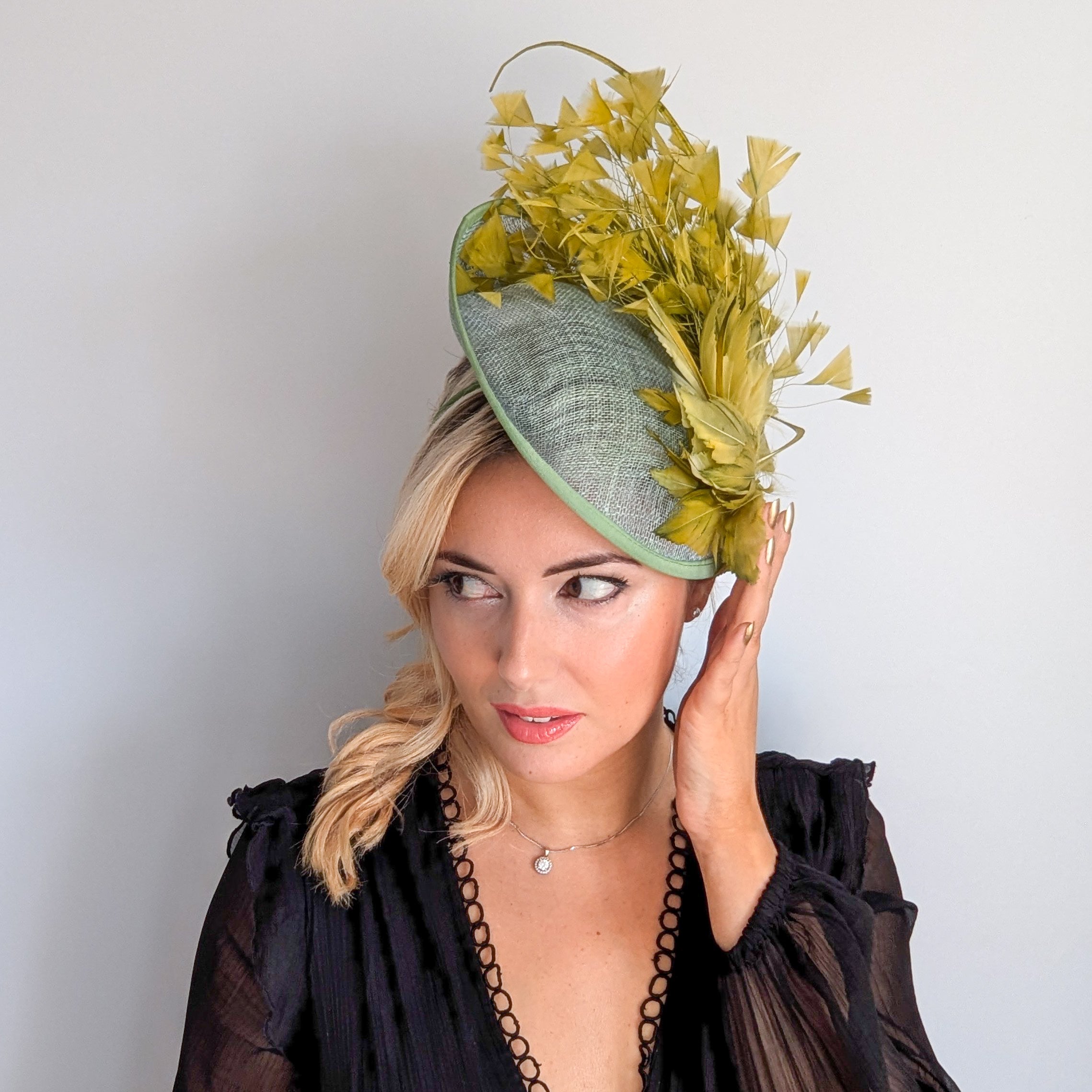 Chartreuse green feather disc fascinator hat