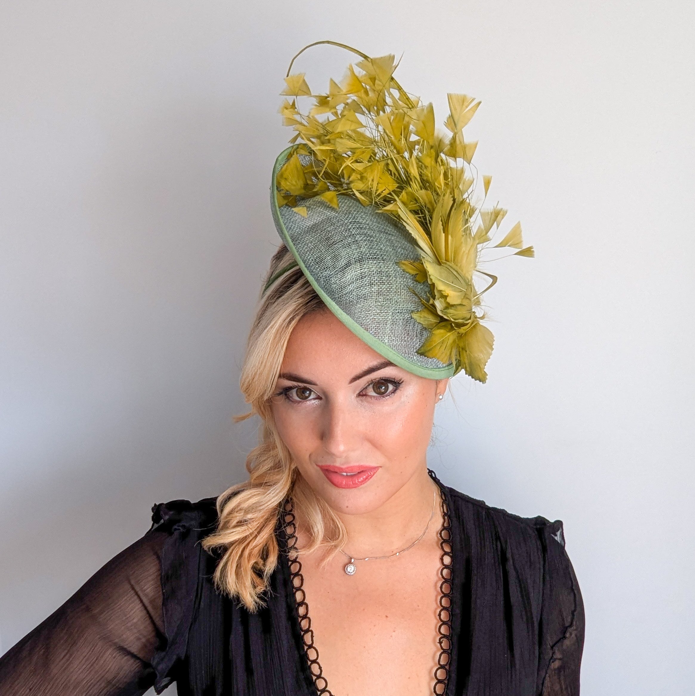 Chartreuse green feather disc fascinator hat