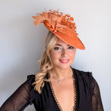 Terracotta dusty orange large feather disc fascinator hat