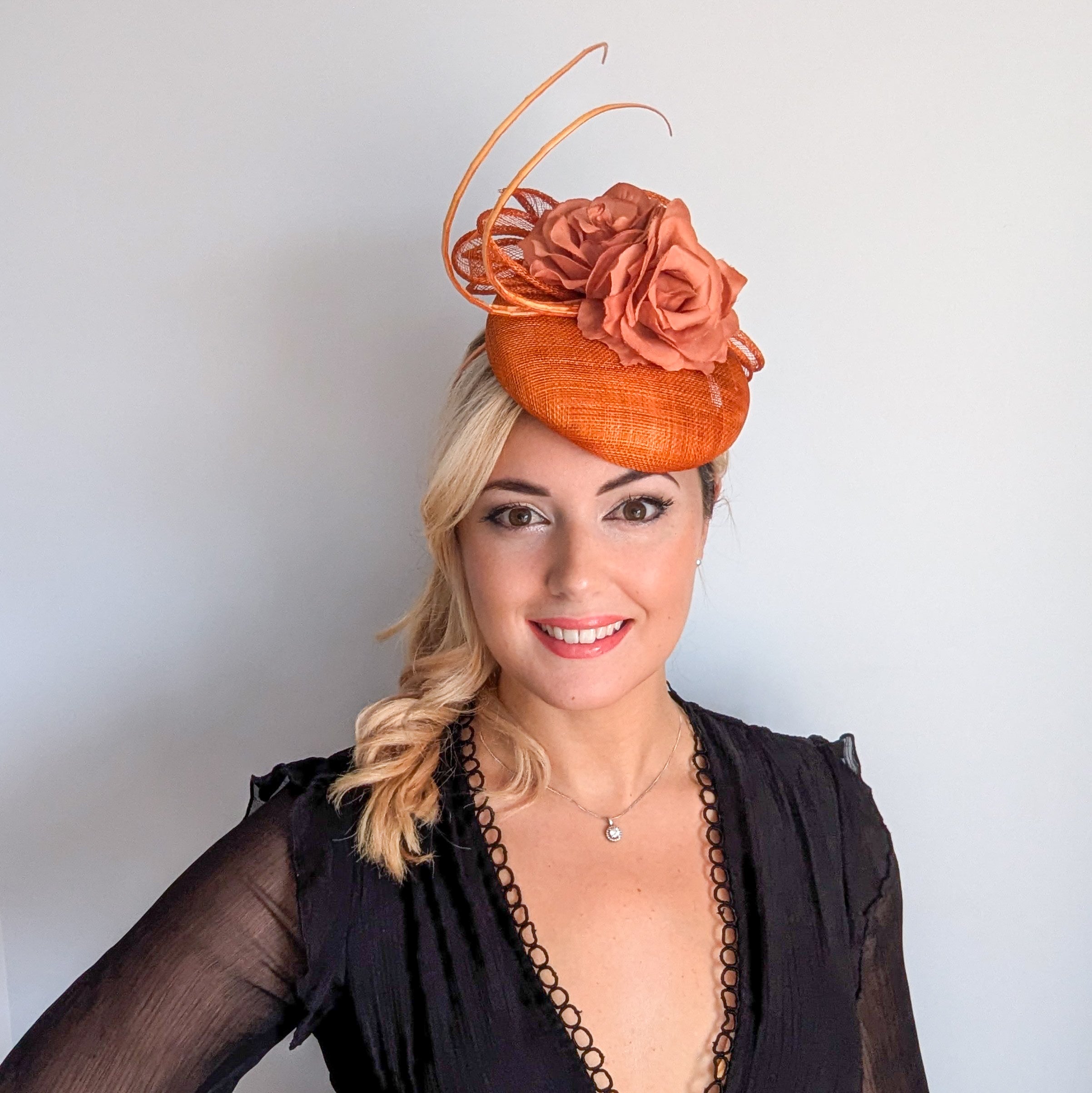 Burnt orange flower fascinator hat