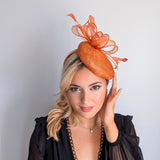 Burnt tangerine orange fascinator hat