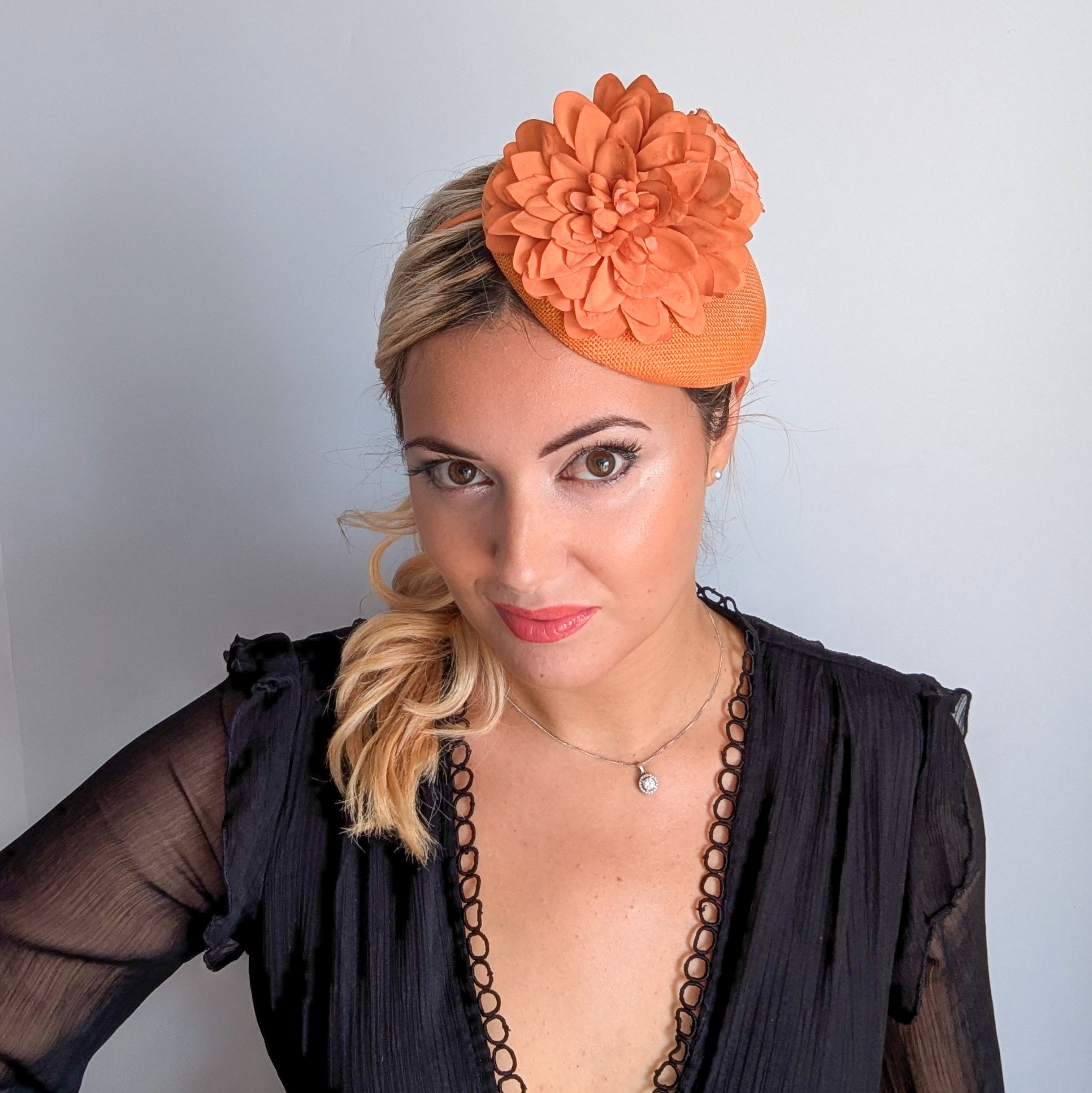 Light orange flower fascinator hat