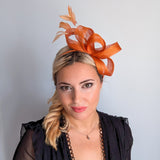 Burnt orange feather fascinator hat