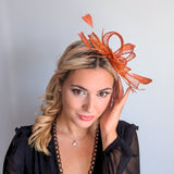Burnt orange feather fascinator hat