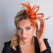 Burnt orange feather fascinator hat