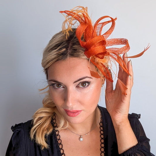 Burnt orange feather fascinator hat