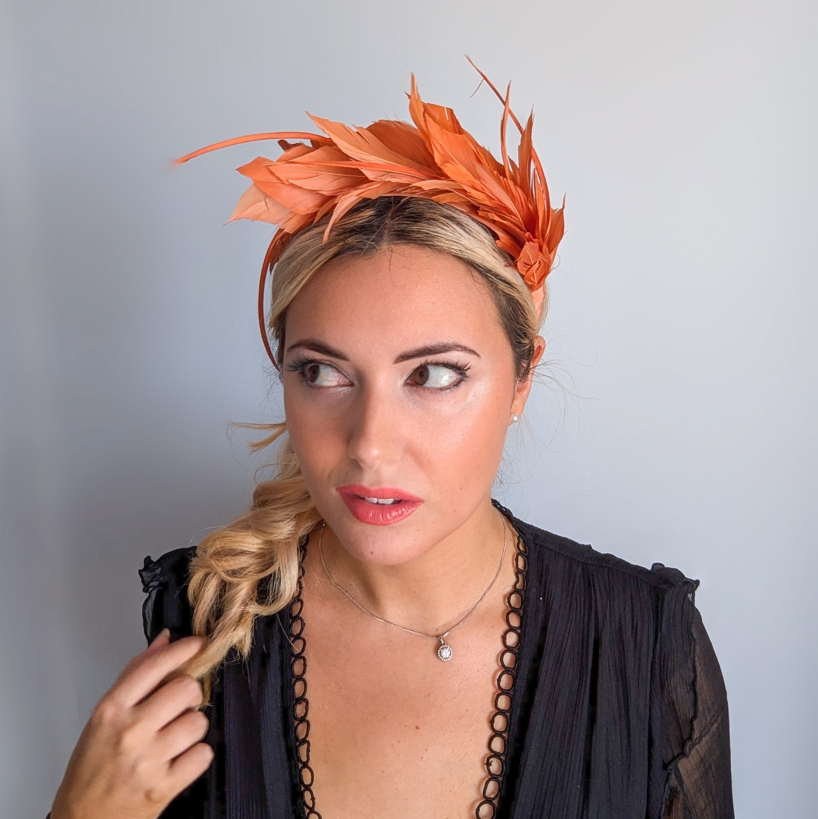 Burnt orange feather satin headband fascinator