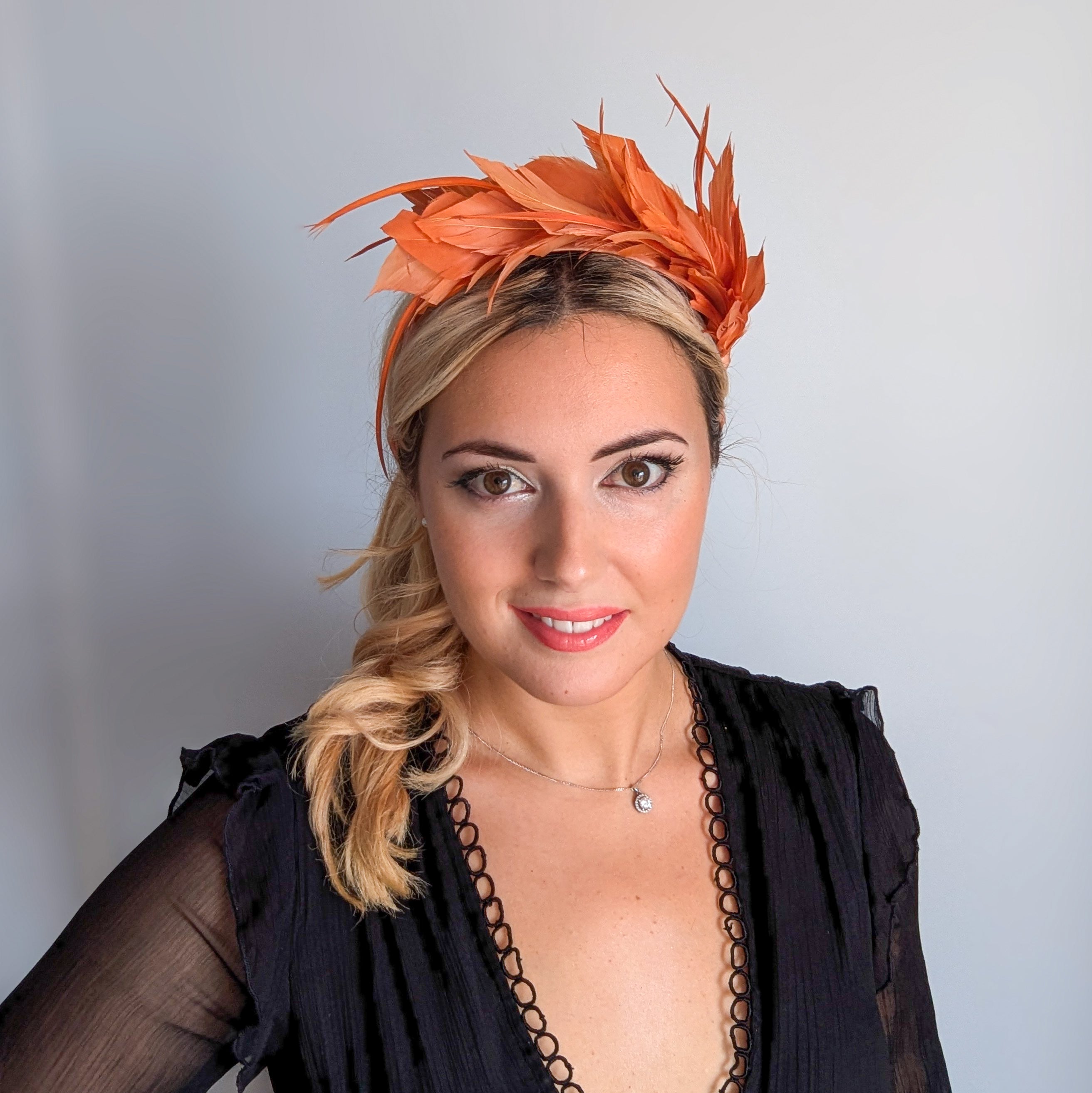 Burnt orange feather satin headband fascinator
