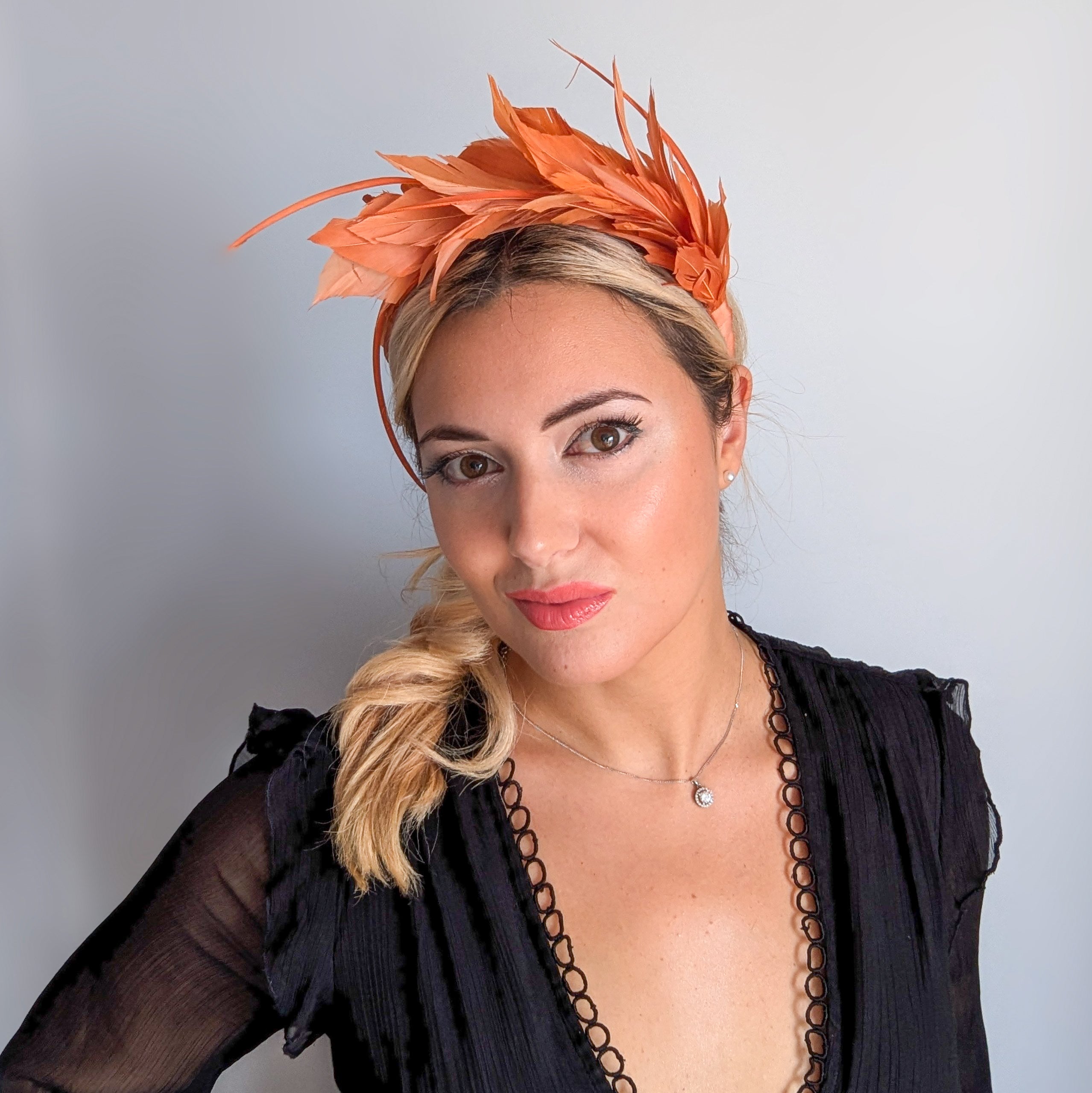 Burnt orange feather satin headband fascinator