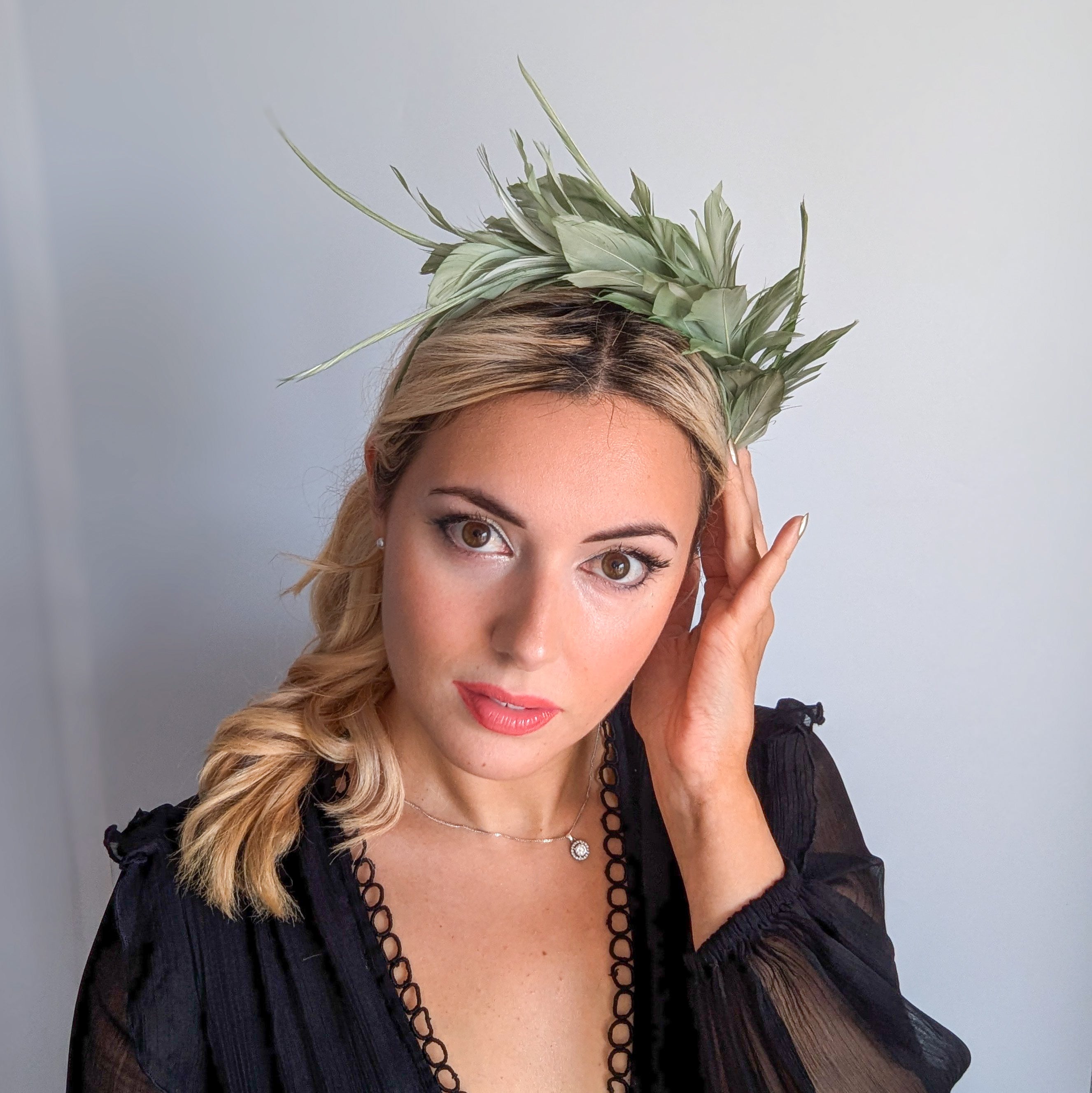 Sage green feather satin headband fascinator