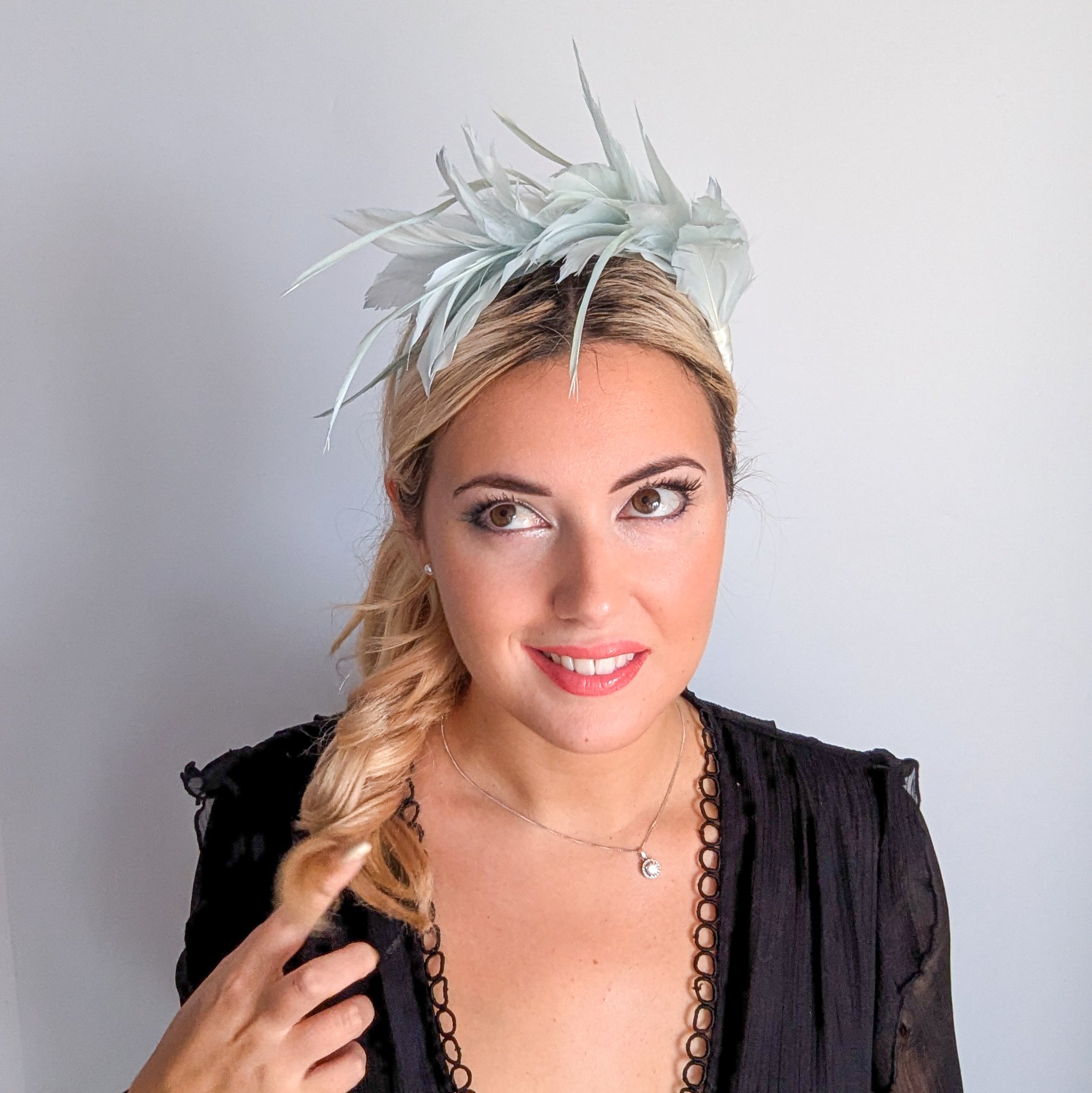 Light aquamarine blue feather satin headband fascinator