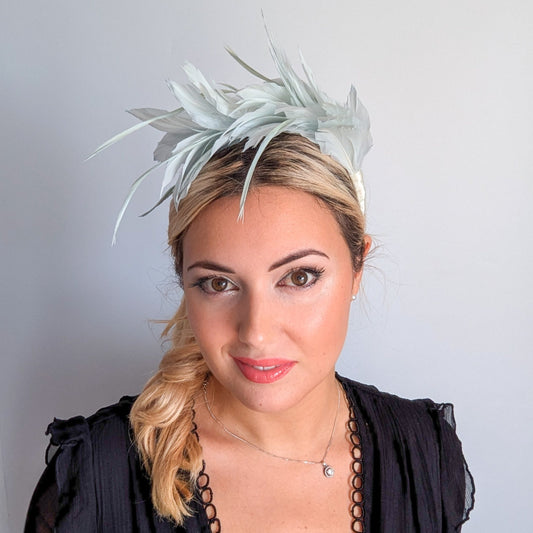 Light aquamarine blue feather satin headband fascinator