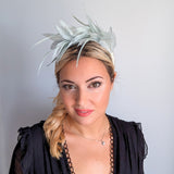 Light aquamarine blue feather satin headband fascinator