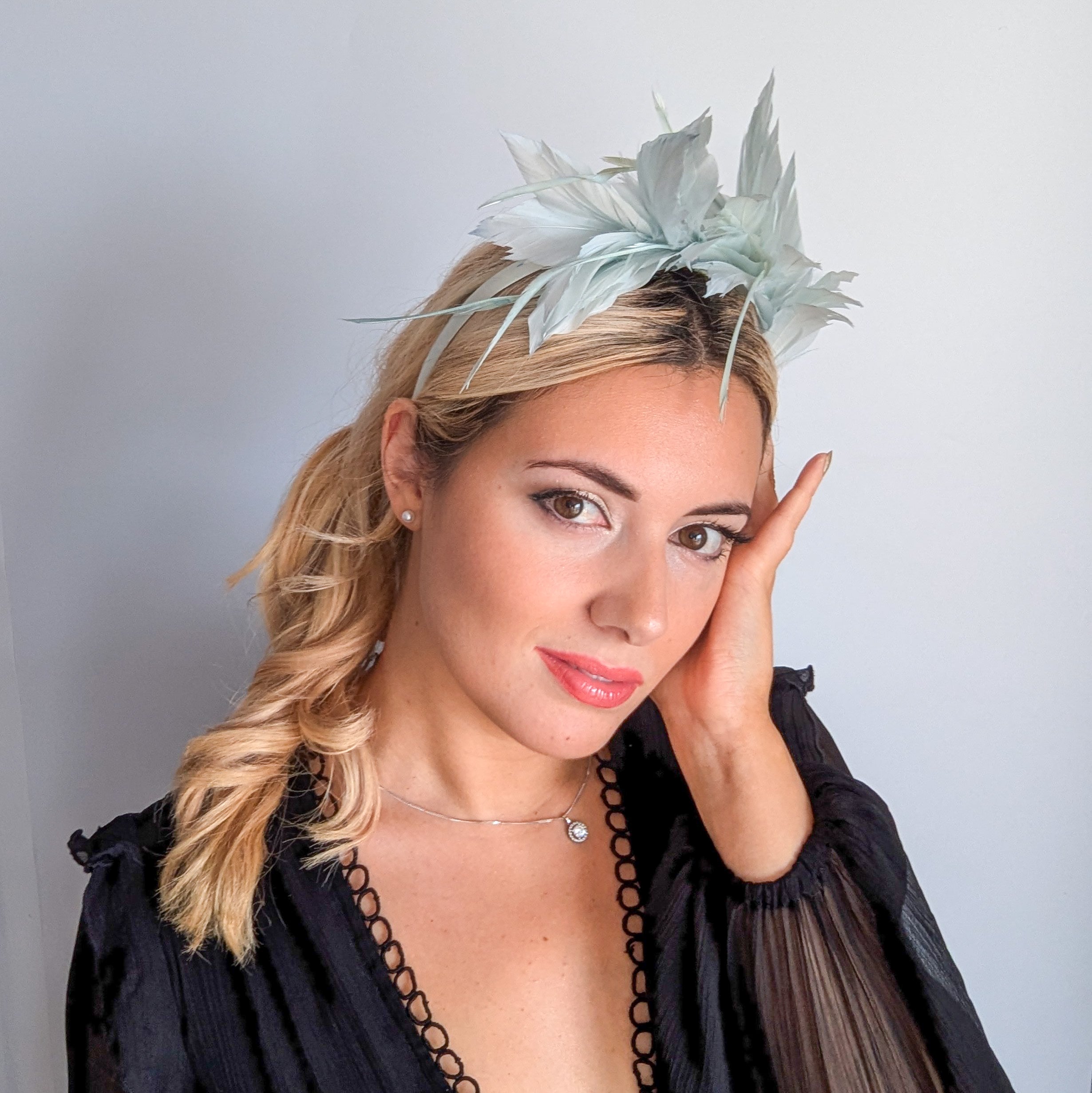 Light aquamarine blue feather satin headband fascinator