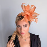 Light orange ombre feather fascinator hat