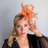 Light orange ombre feather fascinator hat