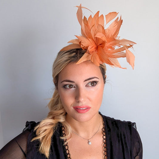 Light orange ombre feather fascinator hat