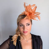 Light orange ombre feather fascinator hat