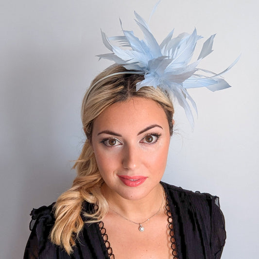 Light baby blue feather fascinator hat
