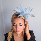 Light baby blue feather fascinator hat