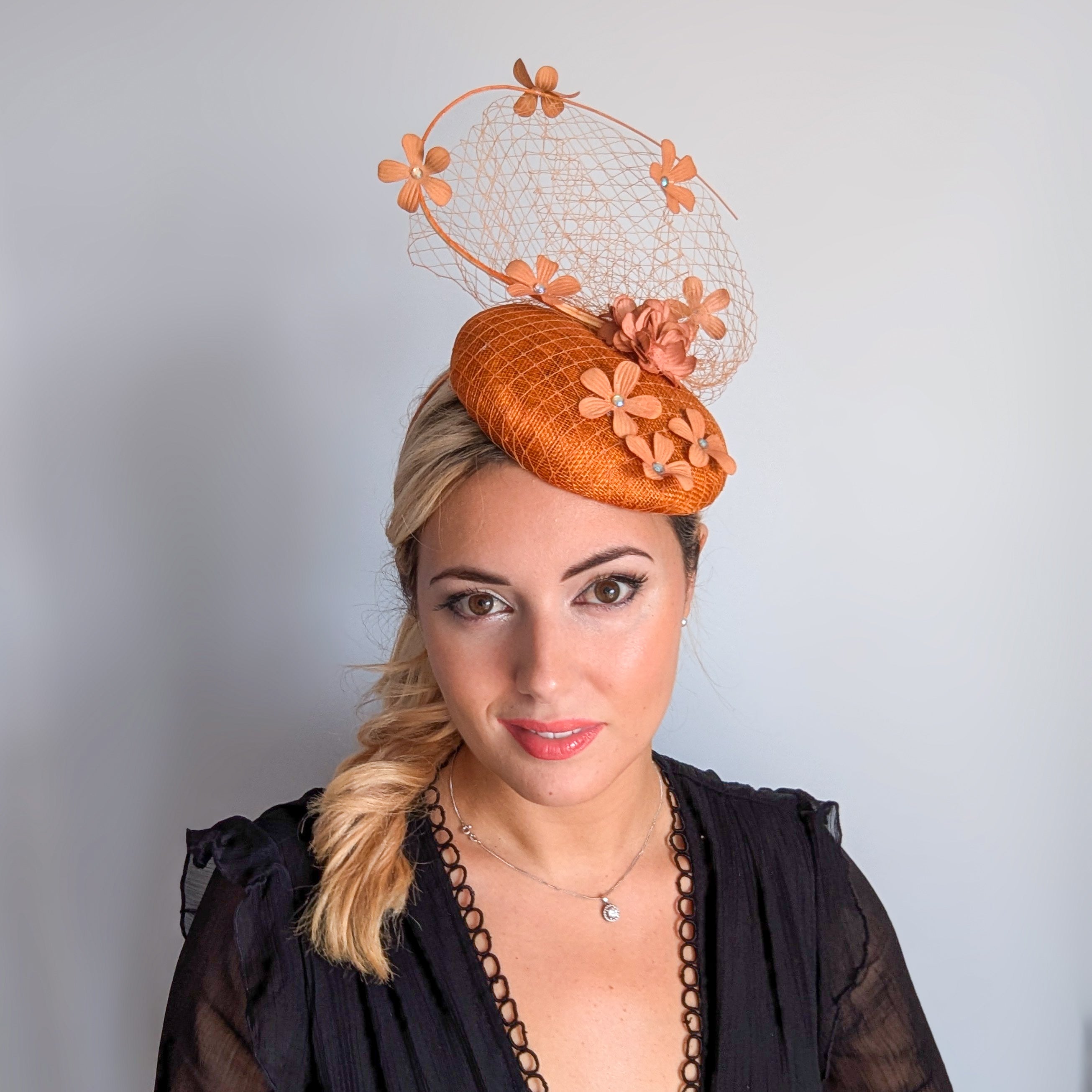 Burnt orange flower fascinator hat